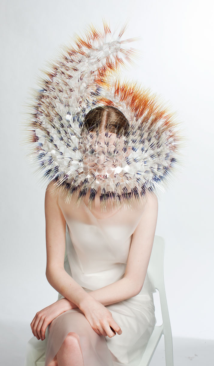 LOOK7: CLEAR FILM, PERSPEX, SILVER.Atmospheric Reentry, MA final Collection, © Maiko Takeda, 2013.Art Direction: Samuel John Weeks, Model: Victoria Savory (STORM), Makeup: Carol Morley, Photographer: Bryan Huynh.(Garment collaboration with Louise Bennetts).