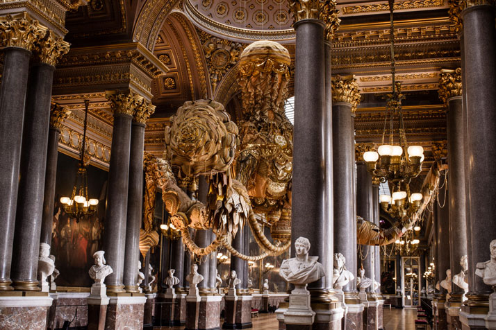 Joana Vasconcelos, Golden Valkyrie, 2012.Handmade woollen crochet, industrial knitted fabric, fabrics, ornaments, polyester, steel cables.650 x 1140 x 1360 cmKalfayan Galleries, Athens2012 Joana Vasconcelos Versailles, Château de Versailles, Versailles.