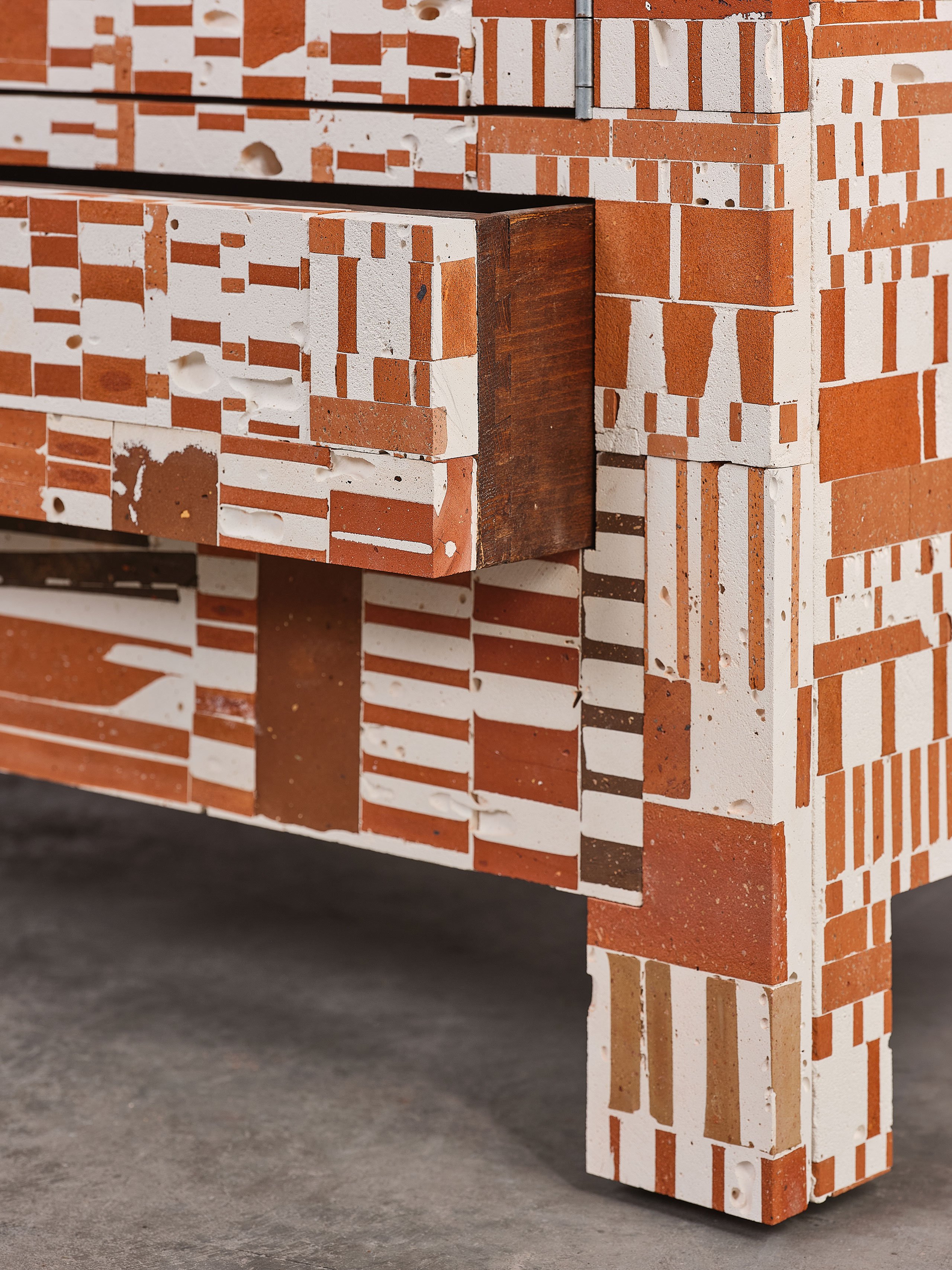 Aurelien Veyrat, Aglomera series, AGF_01 sideboard, 2025. Second hand furniture in oak wood, bricks, plaster, leather. 124 x 53 x 143cm. © Aurelien Veyrat.