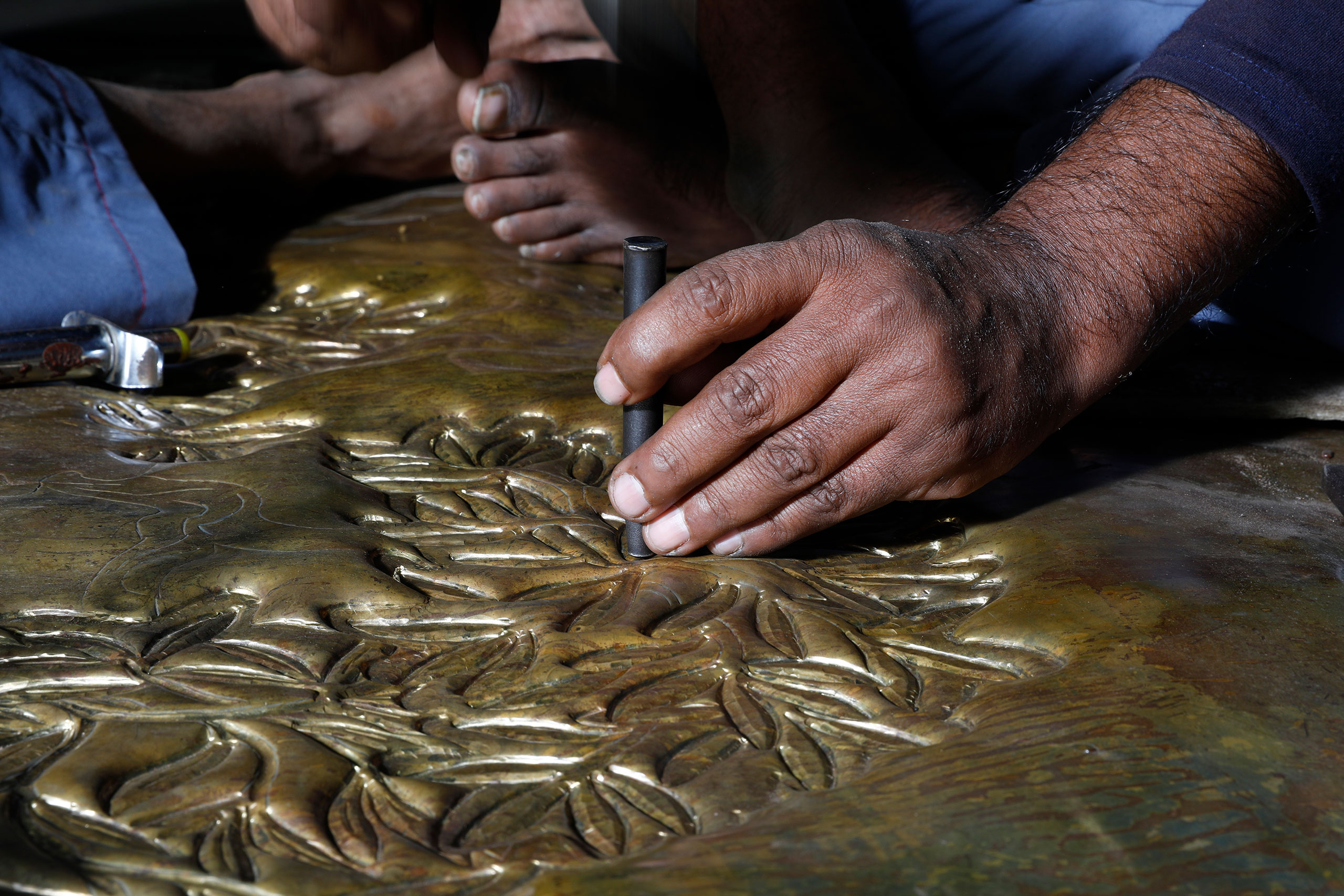 Artisans at work at Vikram Goyal Studio in New Delhi.
Courtesy of Vikram Goyal.