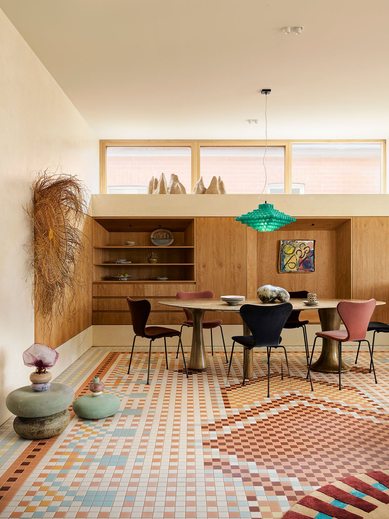 ‘Egyptian Hand Laid Bronze Straw Dining Table’ by Shewekar Elgharably; ‘Series 7 Velvet’ dining chairs by Arne Jacobsen for Fritz Hansen; ‘Archae Pendant Lamp n.411’ by Las Ánimas from Adorno; Vessel (floor, left): ‘Adorned Vessel No. 14 for Exuberance’ (2023) by Minaal Lawn; Vessel (floor, right): ‘Adorned Vessel No. 18 for Stillness’ (2023) by Minaal Lawn; Artwork (left): ‘Marebu Woven Pandanus Mat’ (2023) by Indra Prudence from Craft Victoria; Artwork (right): ‘NO. 201 Park Mews’ (2023) by Jake Walker from Station Gallery; Sculpture (table): ‘Currents’ by Bastard Ceramics from Pépite.
Photography by Anson Smart.