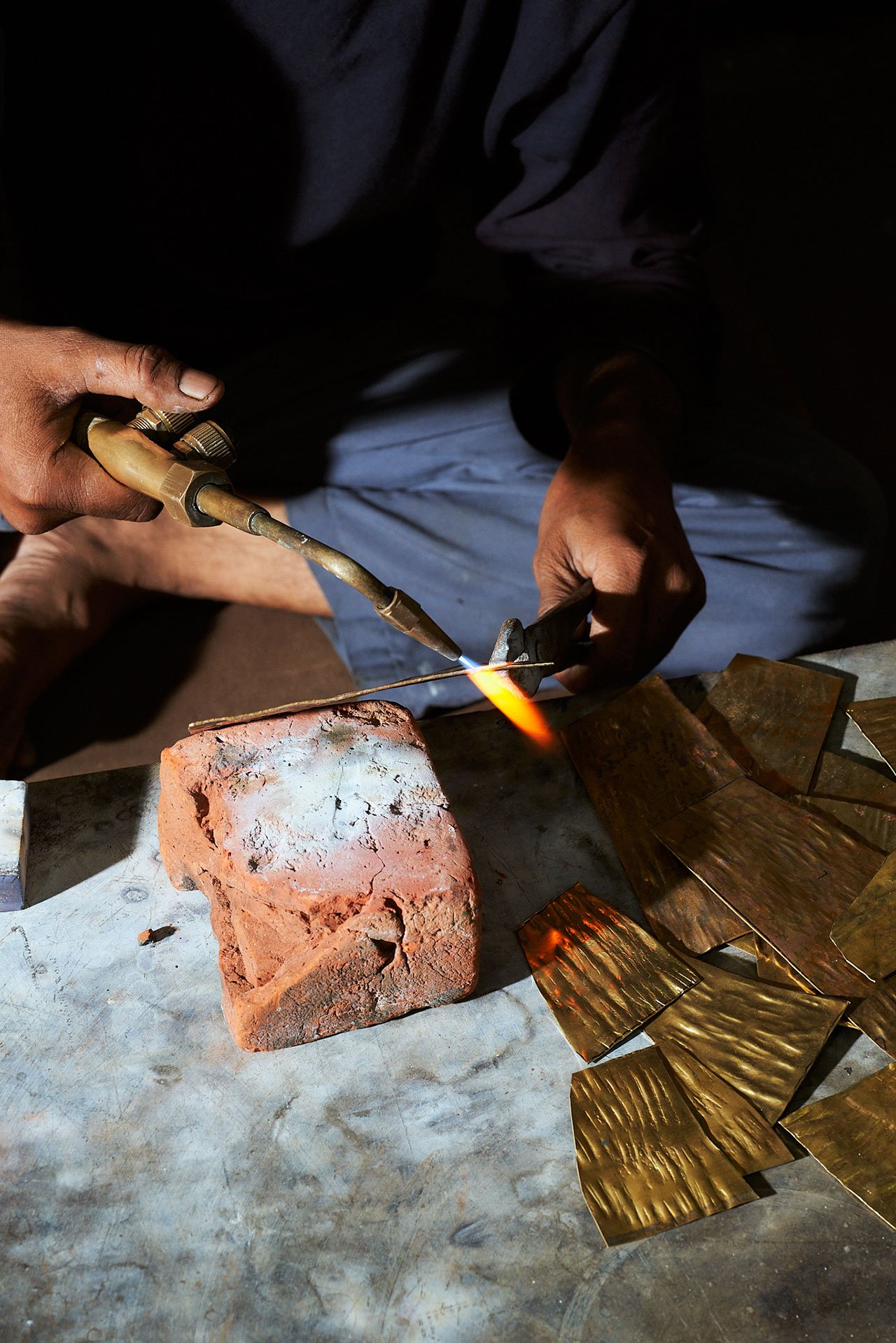 Artisans at work at Vikram Goyal Studio in New Delhi.
Courtesy of Vikram Goyal.