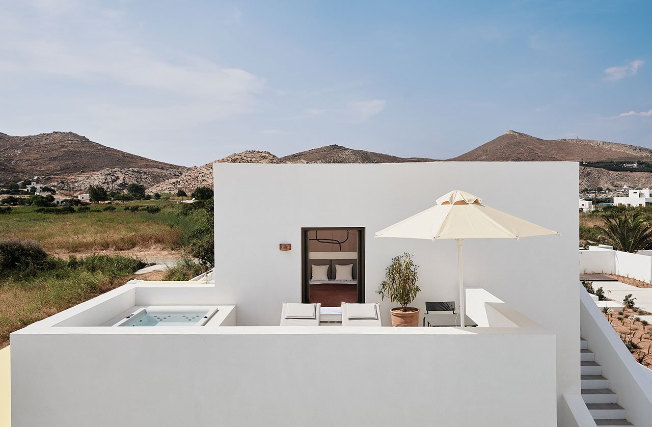 Uranus Suite with private terrace and Jacuzzi. © Parīlio a member of Design Hotels™ | Kolympithres,Naoussa Paros, Greece.Photo by Claus Brechenmacher &amp; Reiner Baumann. Courtesy of Parīlio.