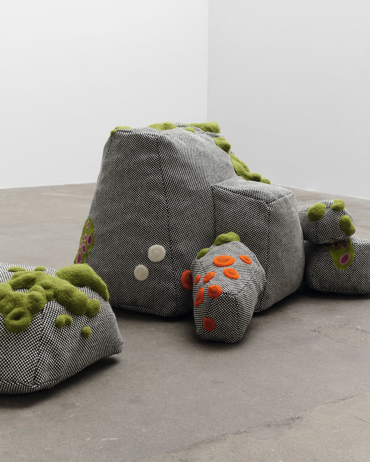 Mending Stones by Ýr Jóhannsdóttir (Ýrúrarí), a series of floor cushion prototypes mimicking rocks and the plants that grown on them. Presented at the ReThink Kvadrat Design Project. photo © Casper Sejersen.