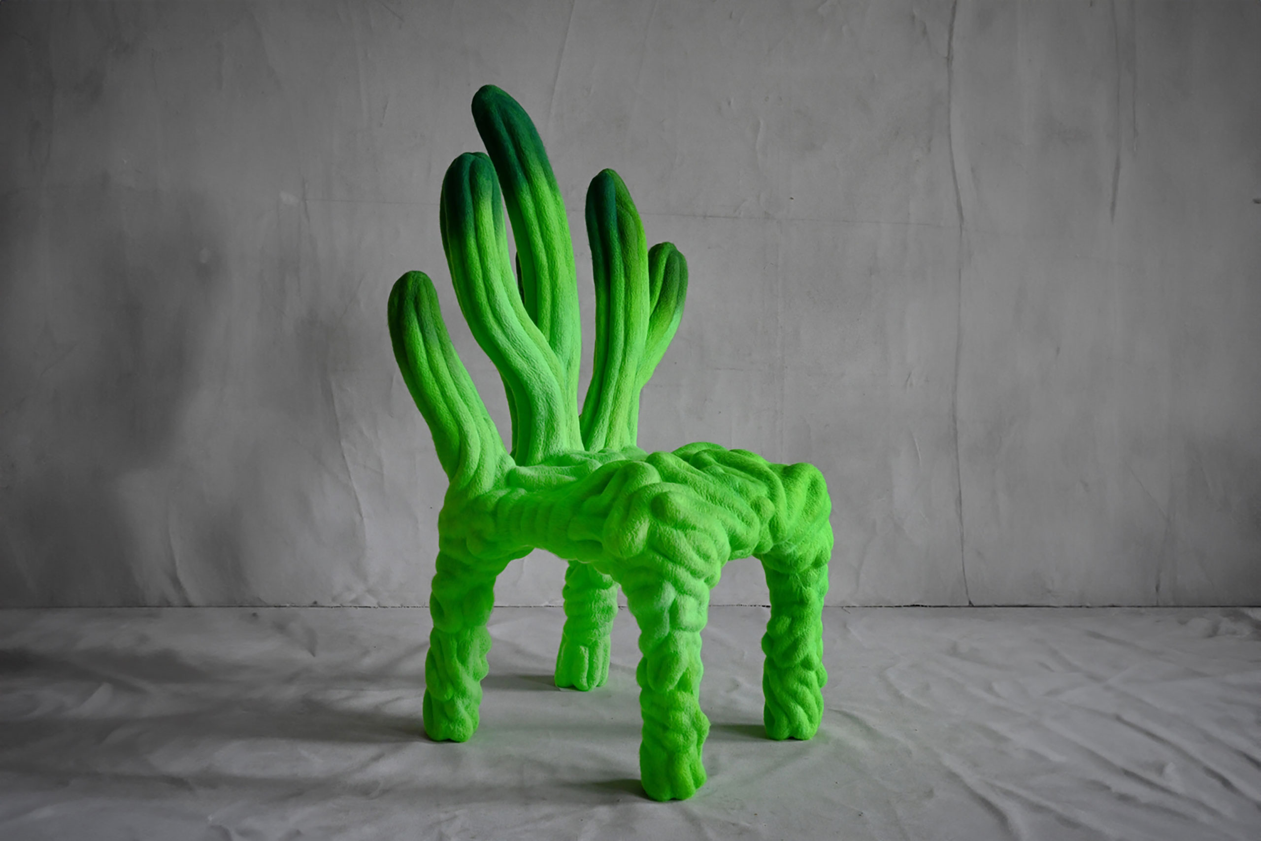 “Chair 16” (2023) by Liam Lee. Needle-felted, acid-dyed merino wool &amp; poplar plywood frame.