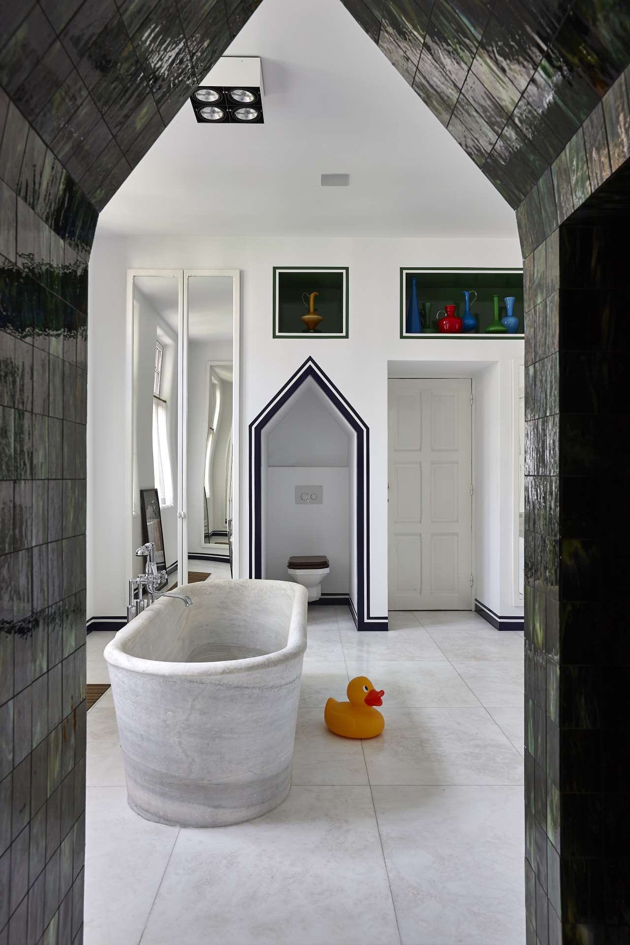 The remodeled bathroom of an Arts &amp; Crafts townhouse is reminiscent of a Greek island. © JPDEMEYER&amp;CO. 