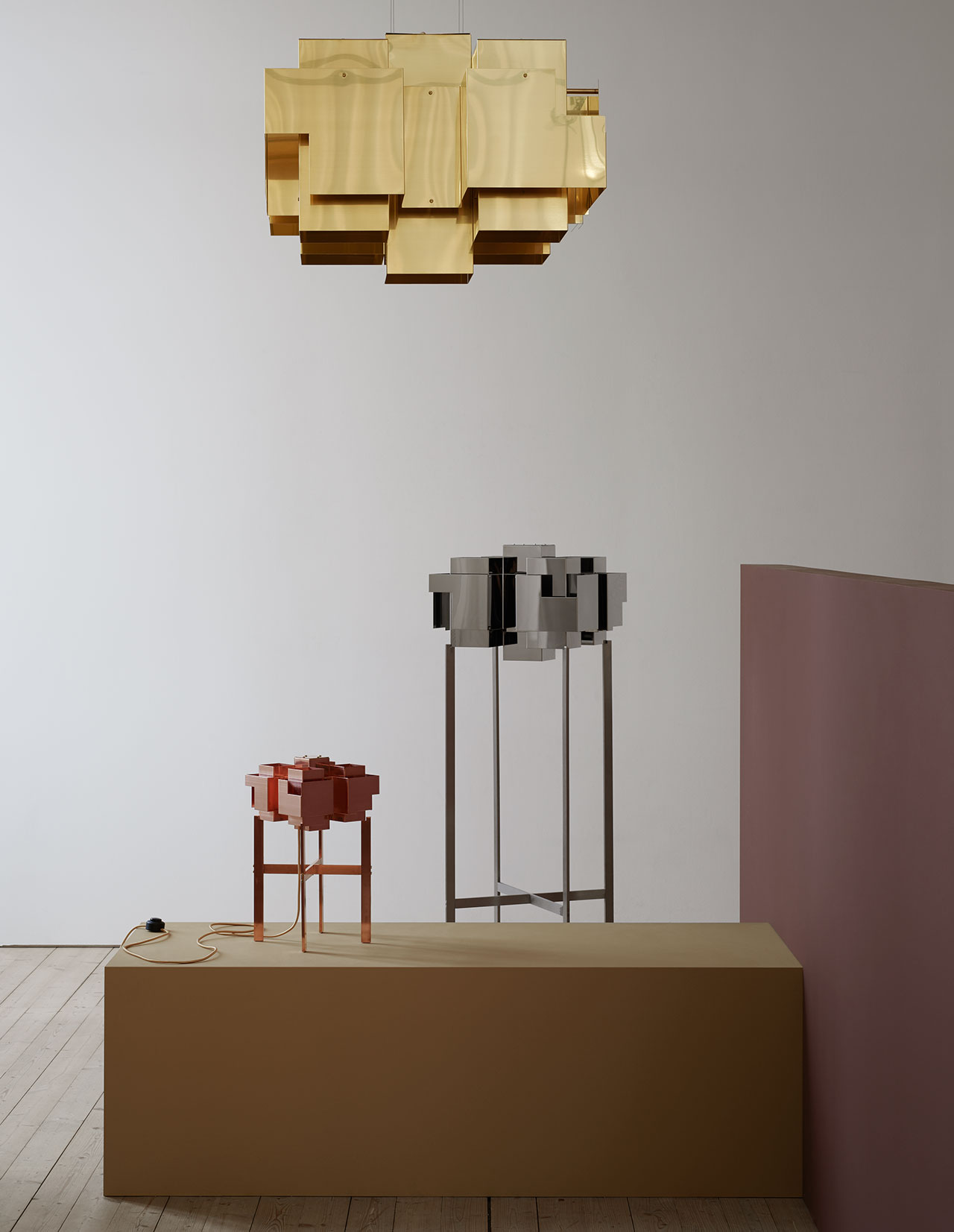 Lamp series Skyline, brass ceiling lamp, chrome floor lamp, copper table lamp, all by Folkform for Örsjö. Photo by Kristofer Johnsson.