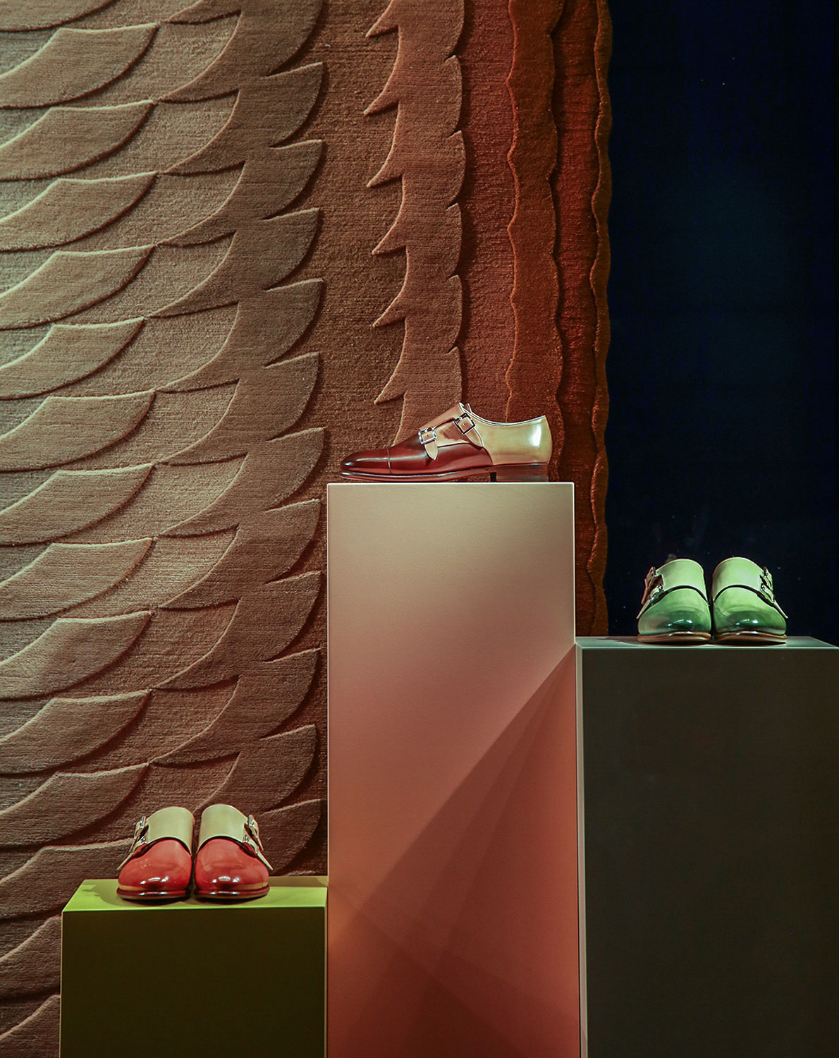 The new collection of Slinkie rugs by Patricia Urquiola for cc-tapis was featured in the window of Santoni boutique among limited-edition double monk shoes which were produced in the same color palette with the rug.